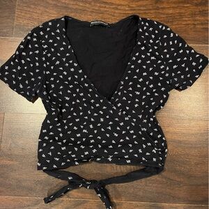 Brandy Melville navy blue floral top